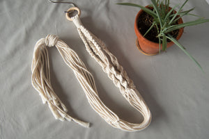 Hand-craft your very own plant hanger in this macrame kit!